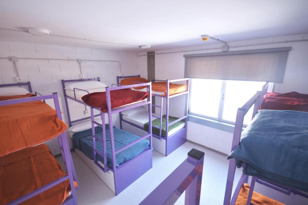 Cama o camas de una habitación en Scout Madrid Hostel