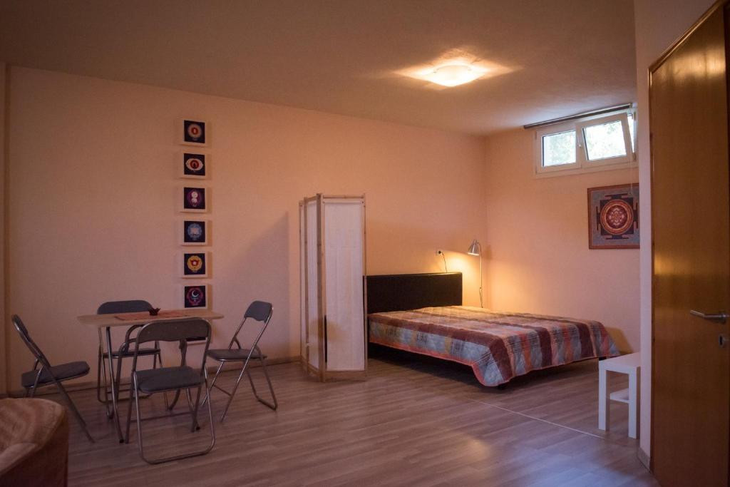 Postel nebo postele na pokoji v ubytování Harmony Studio