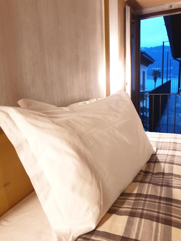Postel nebo postele na pokoji v ubytování Piccolo Hotel Olina