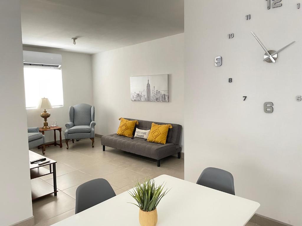 a living room with a couch and chairs at Gabby’s Accesible House in Private area in Mexicali