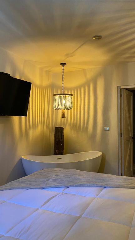 Postel nebo postele na pokoji v ubytování Altamonte Hotel Boutique
