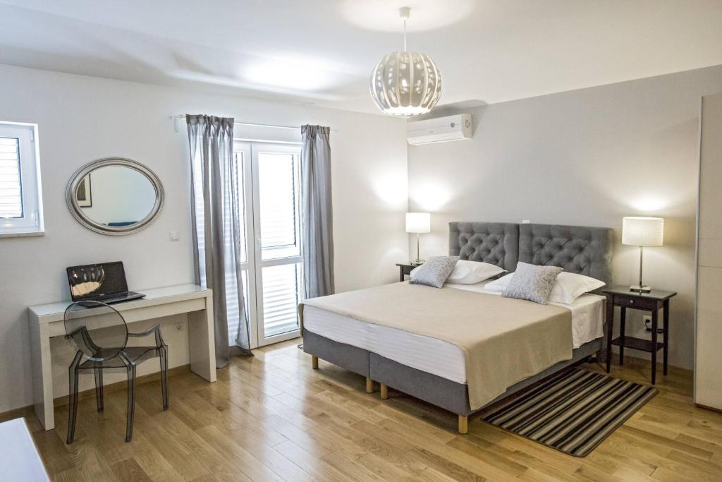 Posteľ alebo postele v izbe v ubytovaní Rooms Margarita