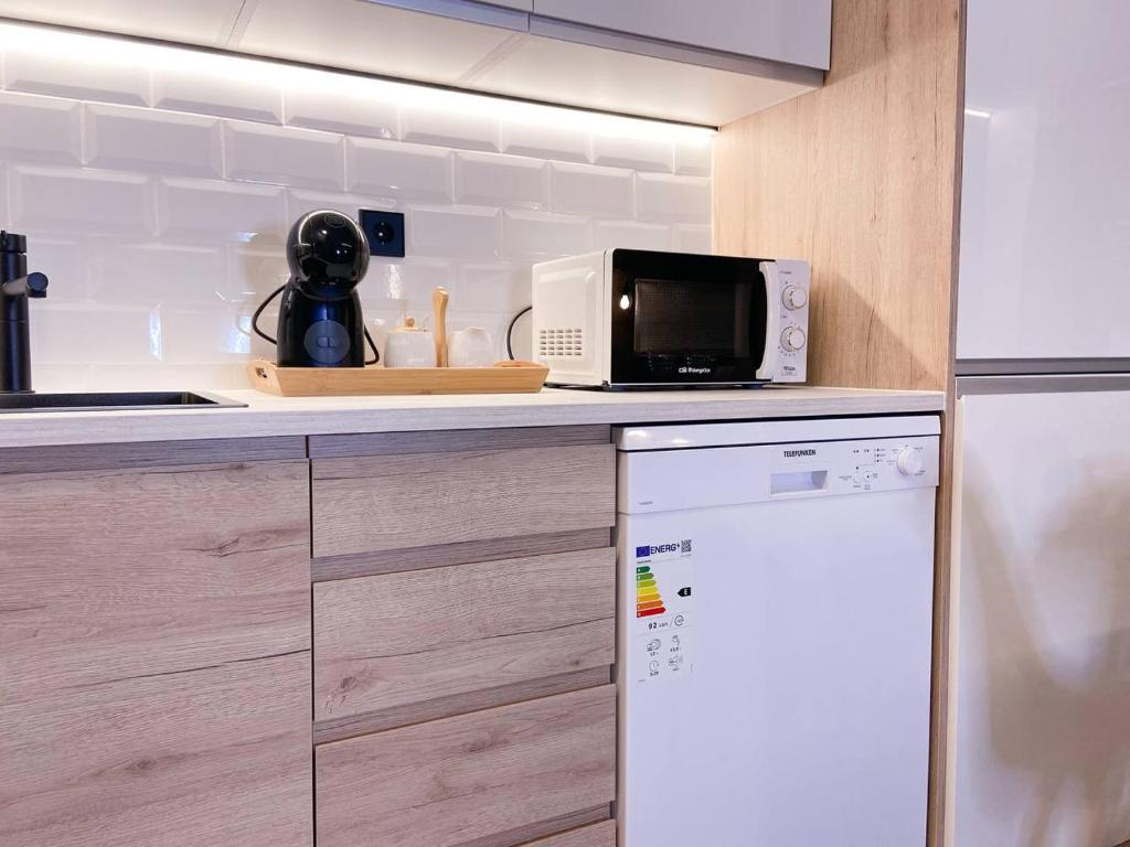 Kuchyň nebo kuchyňský kout v ubytování Apartamento Romántico & Céntrico En Encamp - 4pax l by BonesVacances