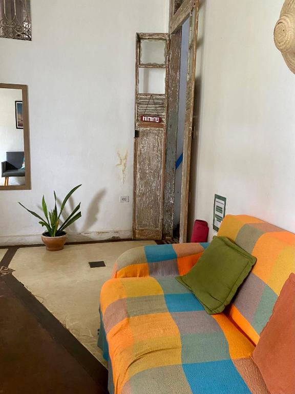 Postel nebo postele na pokoji v ubytování Tropicália Hostel e Pousada