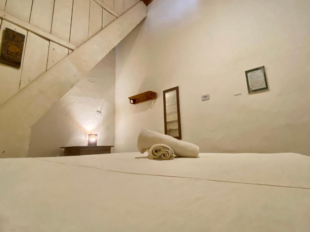 Postel nebo postele na pokoji v ubytování Tropicália Hostel e Pousada