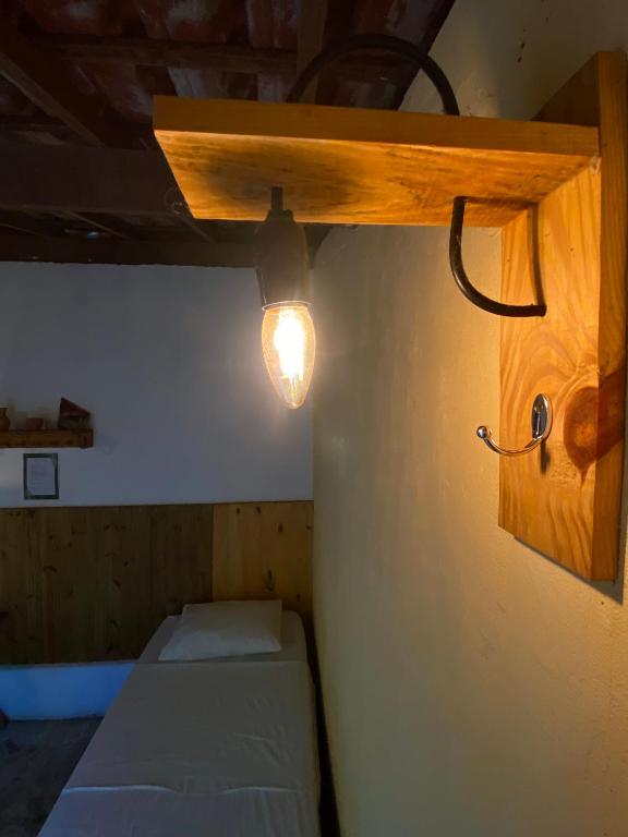 Postel nebo postele na pokoji v ubytování Tropicália Hostel e Pousada