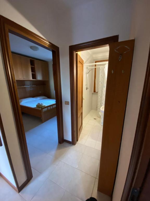 A bed or beds in a room at IL NIDO DI RONDINE