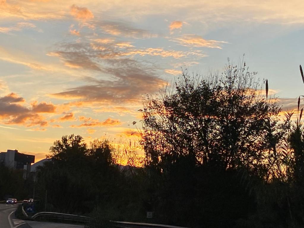 The sunrise or sunset as seen from Az apartmant or nearby