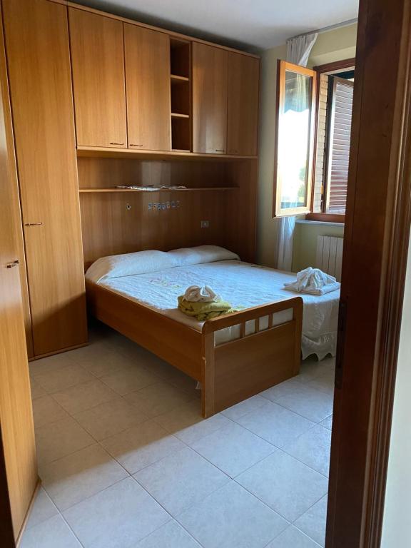 A bed or beds in a room at IL NIDO DI RONDINE