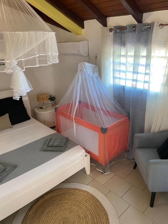 Postel nebo postele na pokoji v ubytování Chez Soul~Etage entier avec vue sur mer