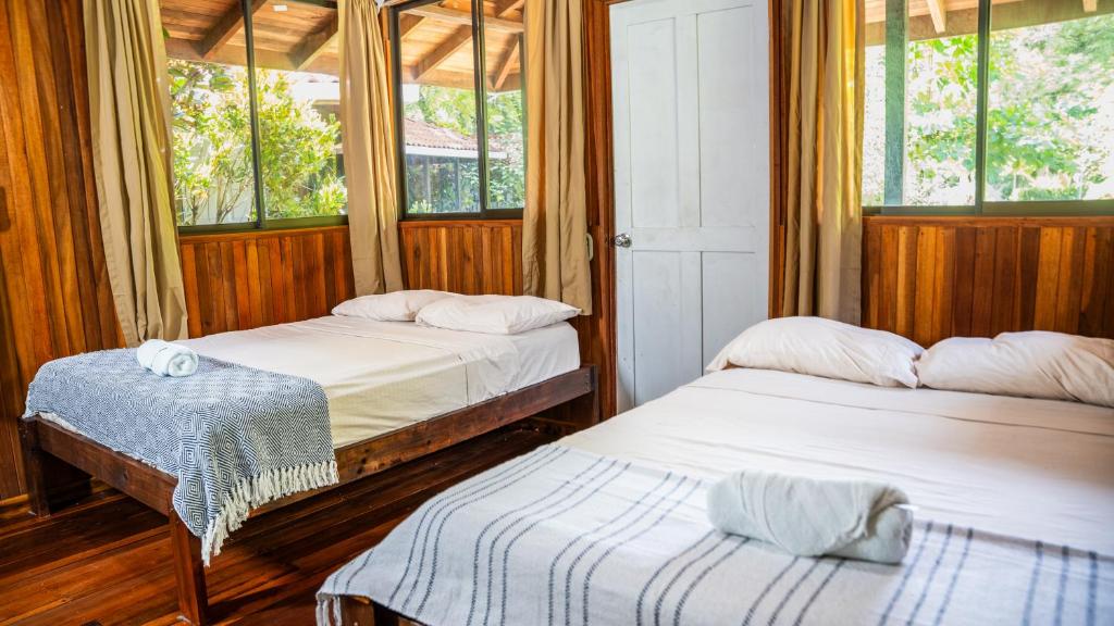 Postel nebo postele na pokoji v ubytování Kalea Yard Hotel