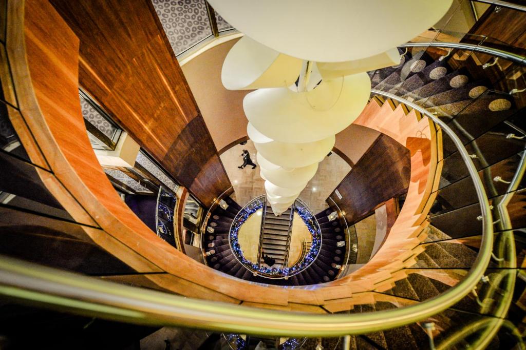 an overhead view of a spiral staircase at Osprey Hotel in Naas