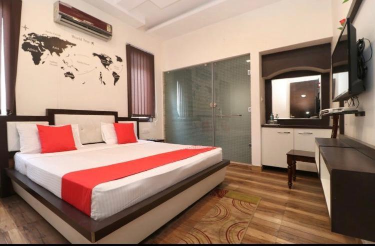 Postel nebo postele na pokoji v ubytování Hotel Unique House