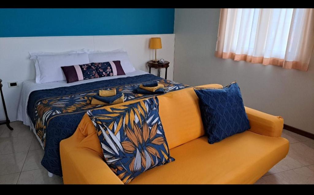 Posteľ alebo postele v izbe v ubytovaní Hotel Elefante