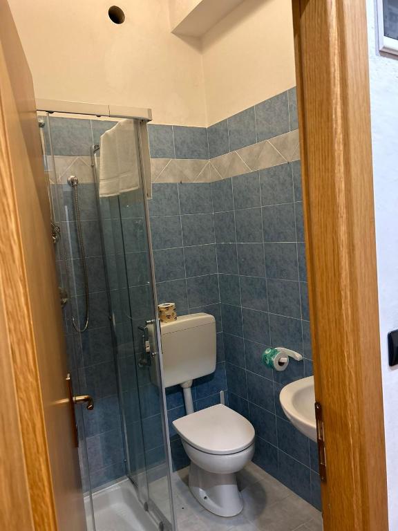 Koupelna v ubytování Hotel Perla