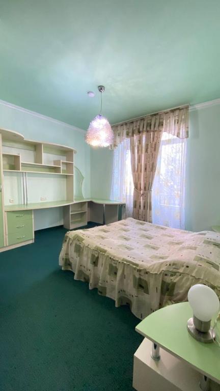 Postel nebo postele na pokoji v ubytování Дом Писателей Цахкадзора
