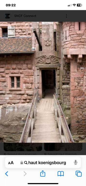 a picture of a wooden walkway in a building at MOBIL HOME Clim BOOFZHEIM 6 PERSONNES 3 CHAMBRES LE RIED 3 ETOILES PROCHE EUROPA PARK in Boofzheim