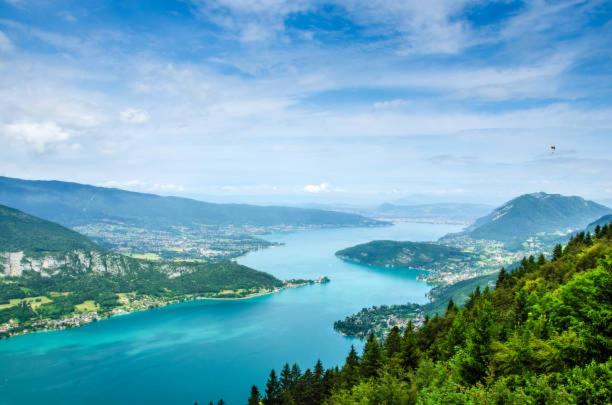 a view of a body of water from a mountain at chez Caroline in Annecy