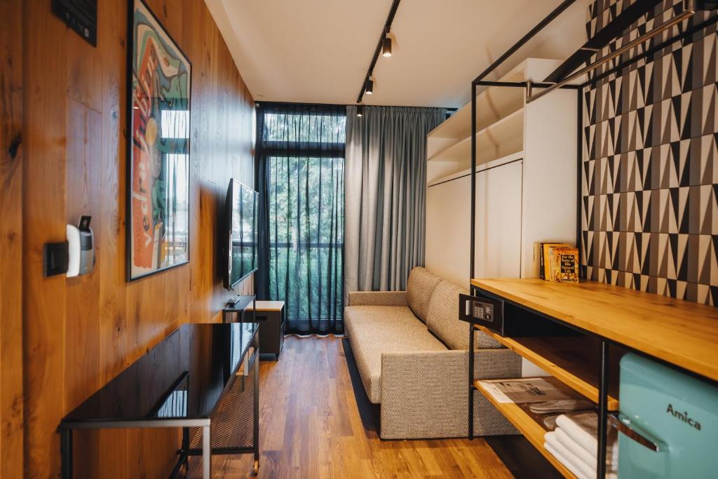 Kuchyň nebo kuchyňský kout v ubytování City Glamping by ONE66 Hotel