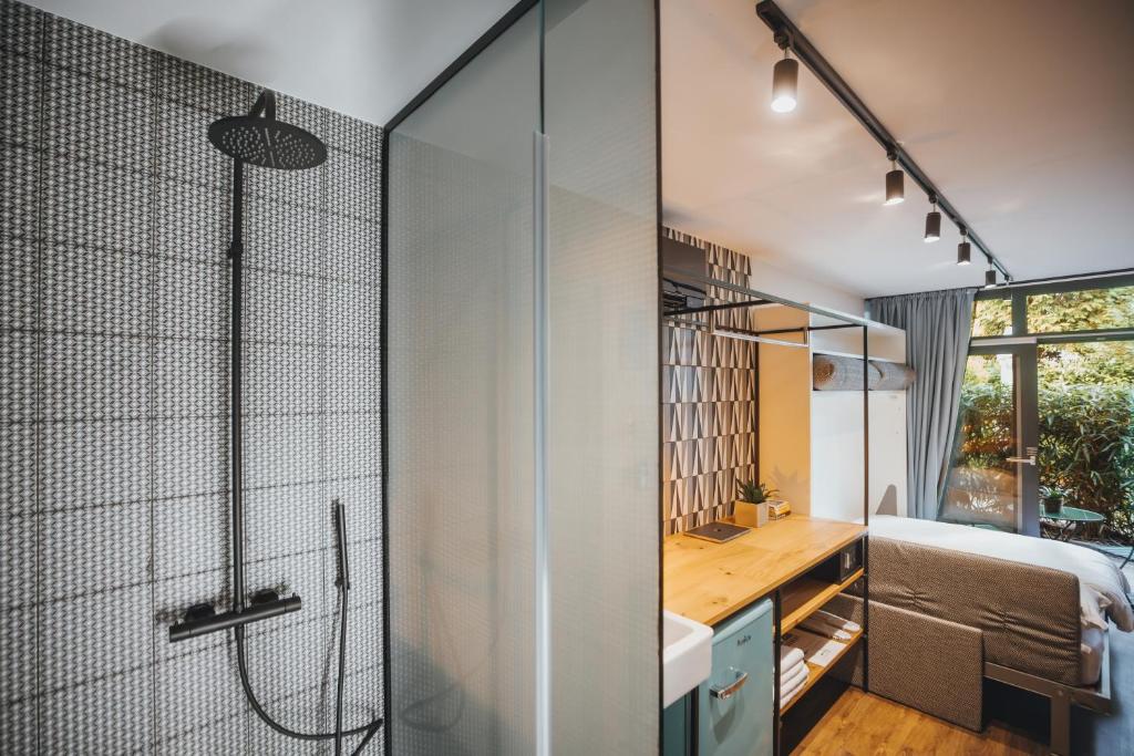 Postel nebo postele na pokoji v ubytování City Glamping by ONE66 Hotel