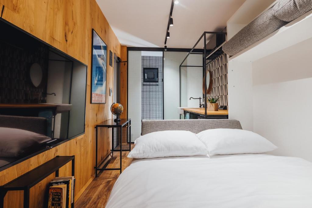 Postel nebo postele na pokoji v ubytování City Glamping by ONE66 Hotel