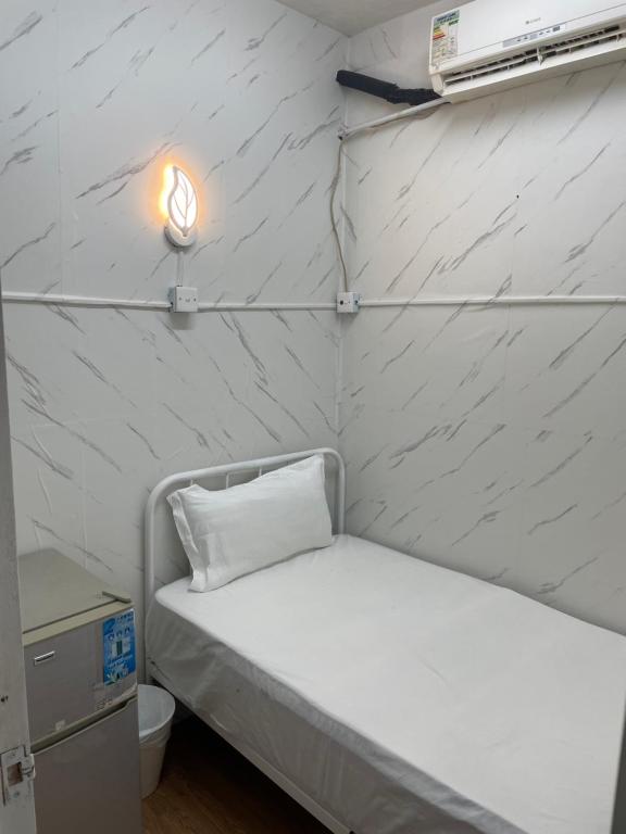 Postel nebo postele na pokoji v ubytování Relaince international hostel