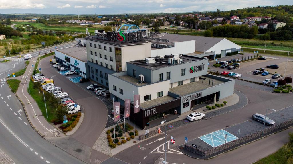 an aerial view of a building with a parking lot at Hotel Scout in Częstochowa