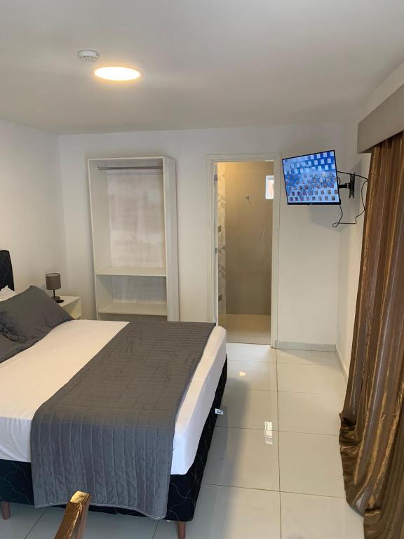 Postel nebo postele na pokoji v ubytování Hotel Renty Beach