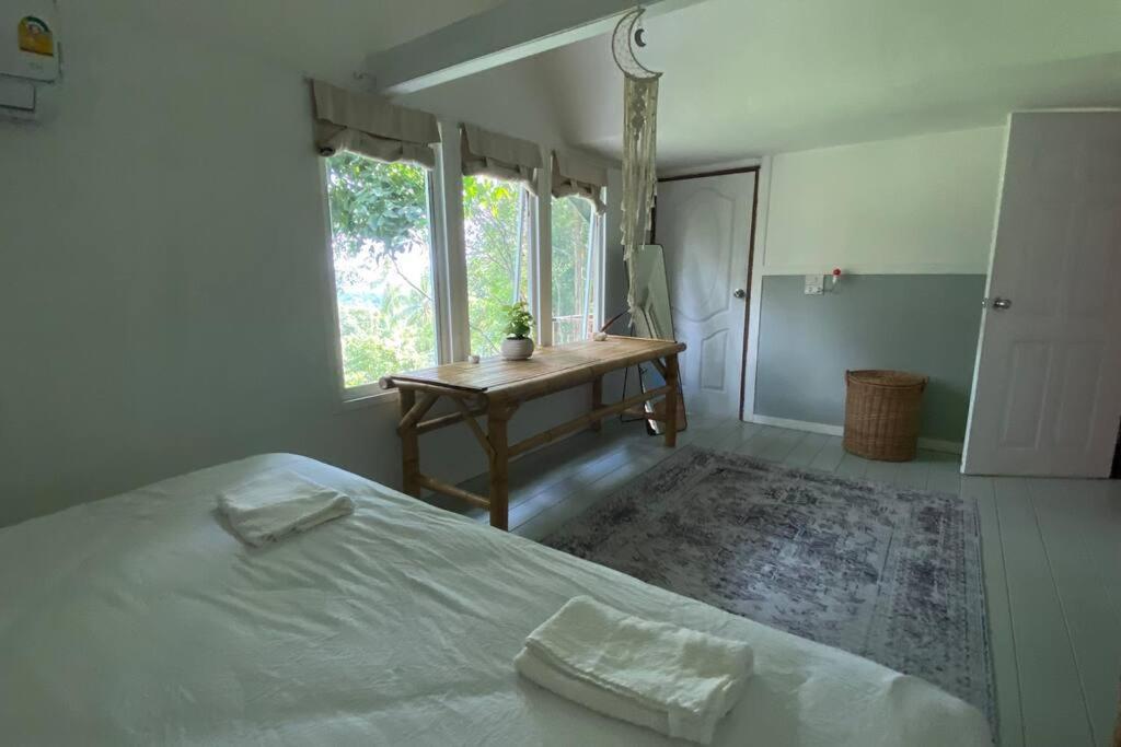 Postel nebo postele na pokoji v ubytování Jungle Living Experience