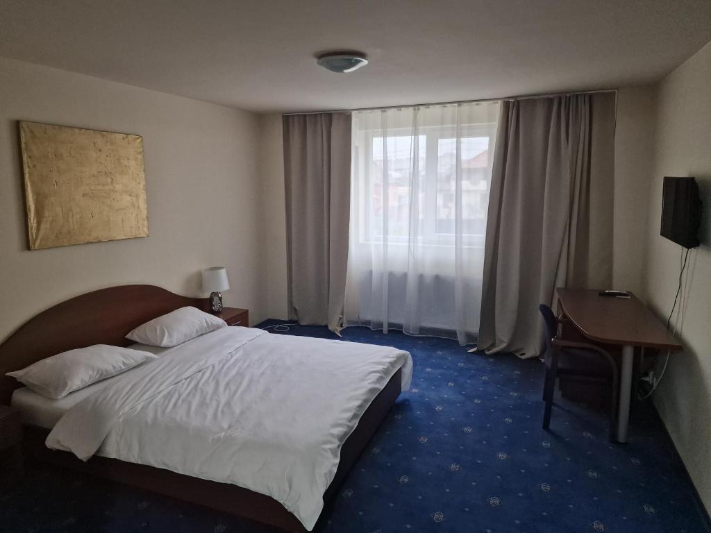 Postel nebo postele na pokoji v ubytování Eden