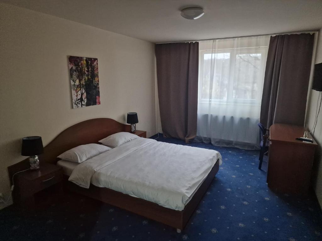 Postel nebo postele na pokoji v ubytování Eden