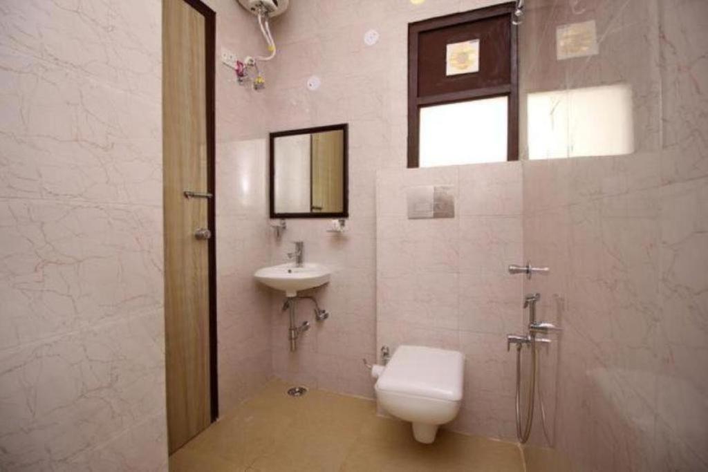 Koupelna v ubytování Hotel Smart Stay