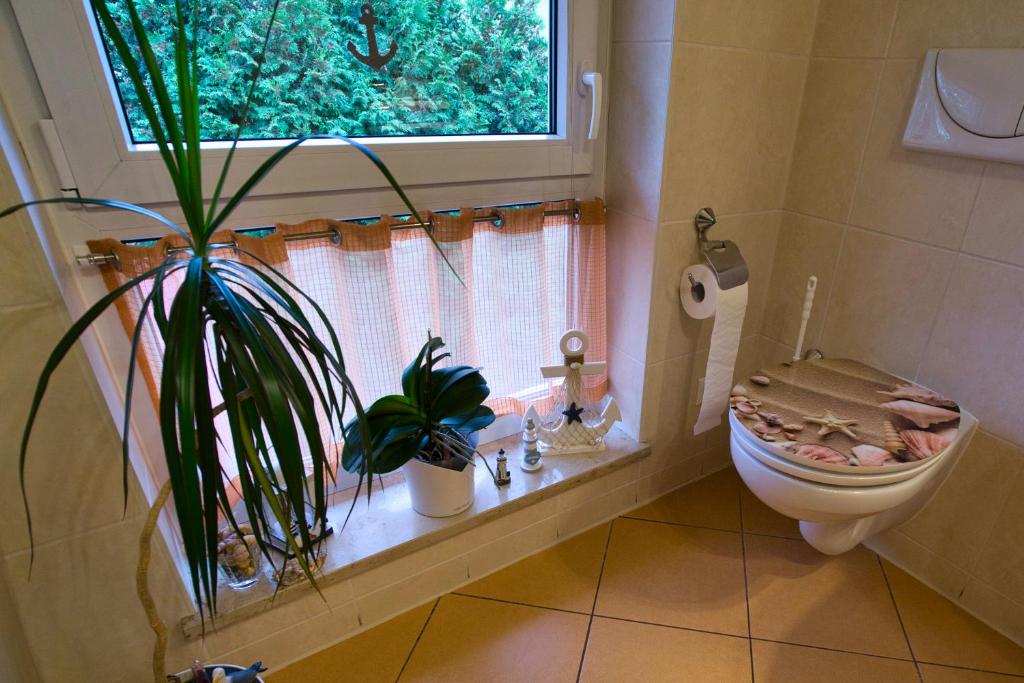 Koupelna v ubytování myCozyPlace - Zwei gemütliche Zimmer für Vier