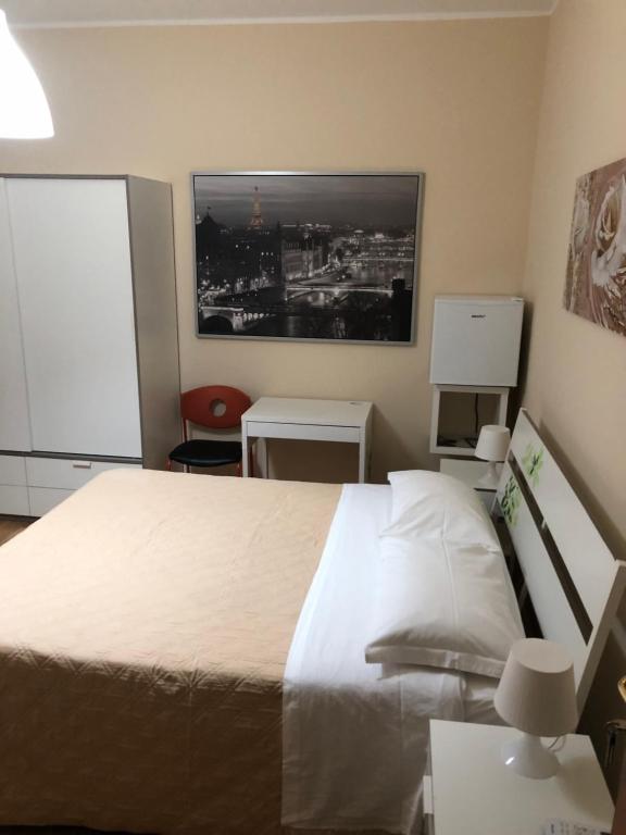 Postel nebo postele na pokoji v ubytování Moon River Guest House