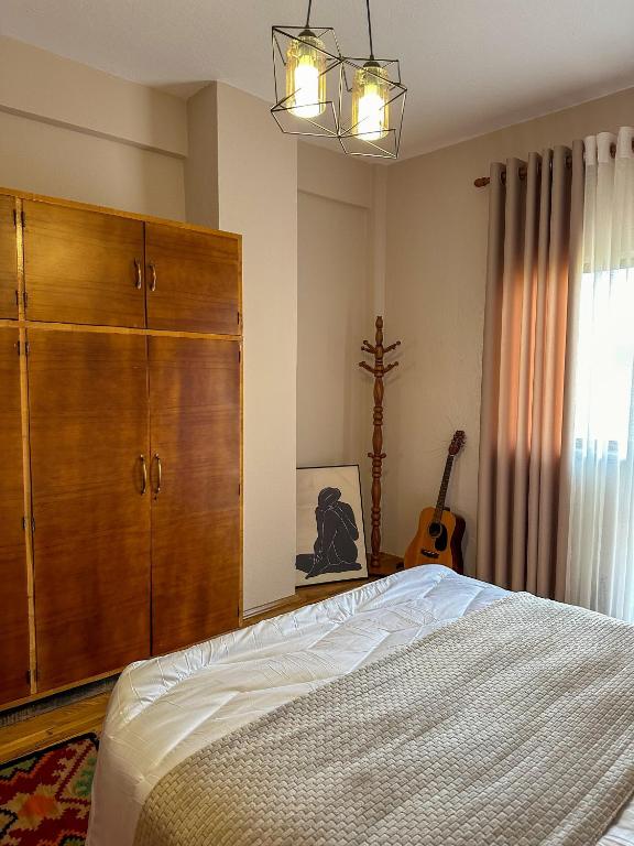 Postel nebo postele na pokoji v ubytování Villa Malo Guesthouse