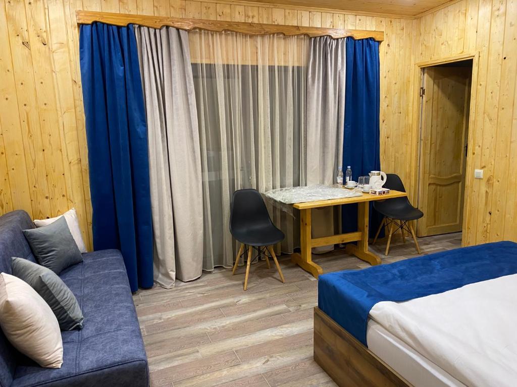 Postel nebo postele na pokoji v ubytování Haleb Hotel Complex