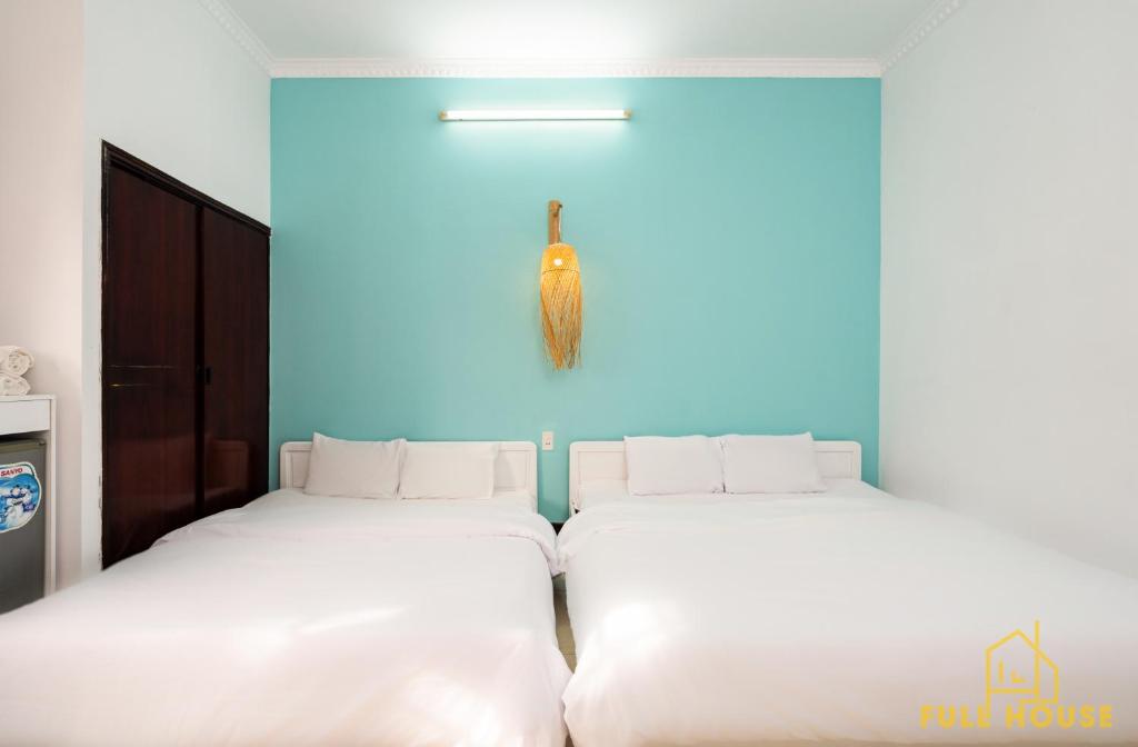 Voodi või voodid majutusasutuse M2 Villa Hotel Vũng Tàu toas