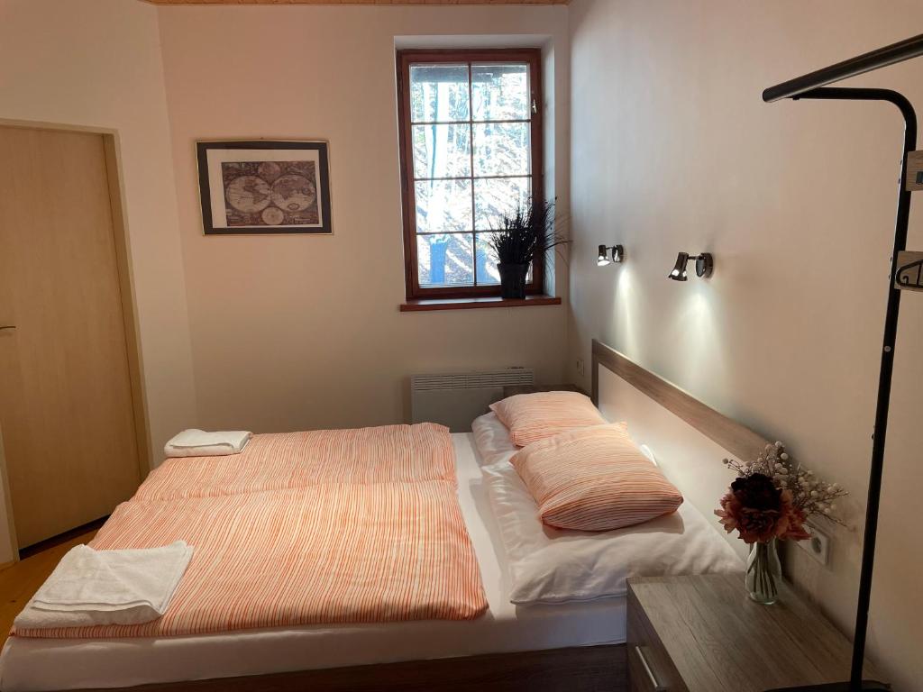 Postel nebo postele na pokoji v ubytování Apartmány Telnice - Medorhof