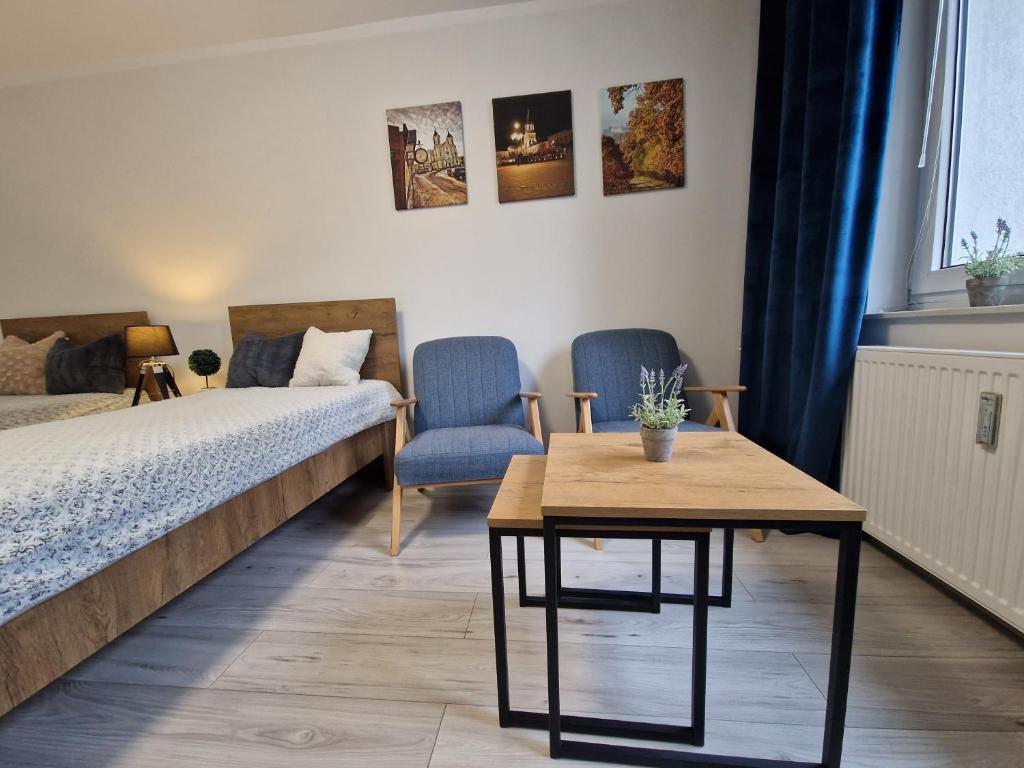 Postel nebo postele na pokoji v ubytování Apartament w Śródmieściu
