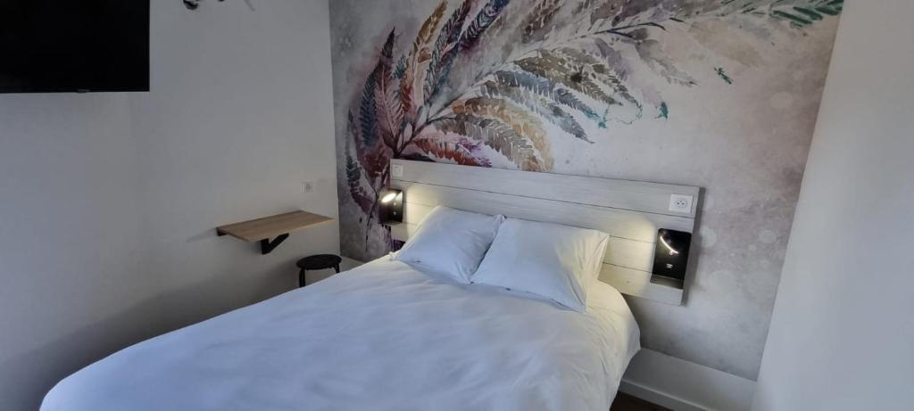 Postel nebo postele na pokoji v ubytování O'Cub Hotel