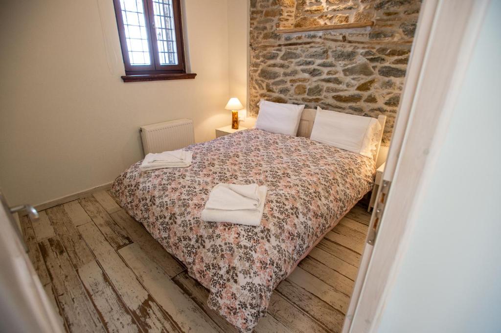 Postel nebo postele na pokoji v ubytování Ιkia Zmas
