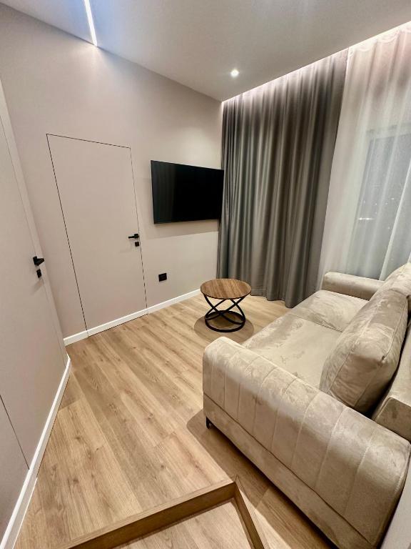TV a/nebo společenská místnost v ubytování Venis Hotel