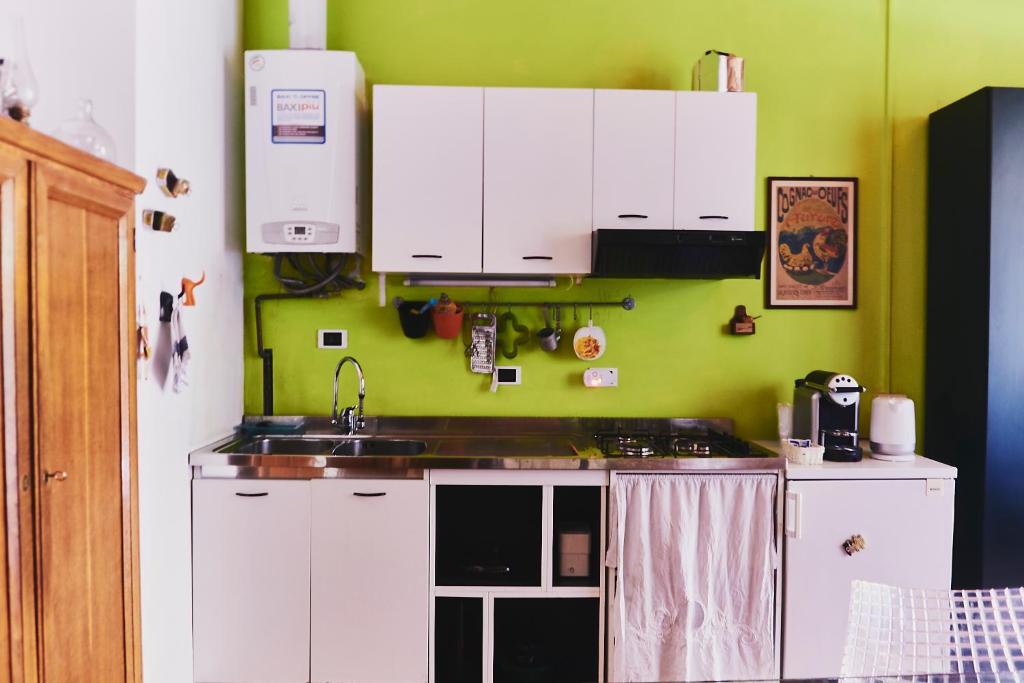 Kuchyňa alebo kuchynka v ubytovaní Lovelyloft - Alzaia Naviglio