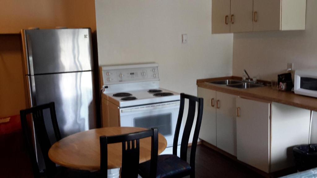 Kuchyň nebo kuchyňský kout v ubytování Mountain View Motel