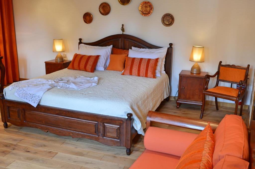 Postel nebo postele na pokoji v ubytování Hotel Ellique