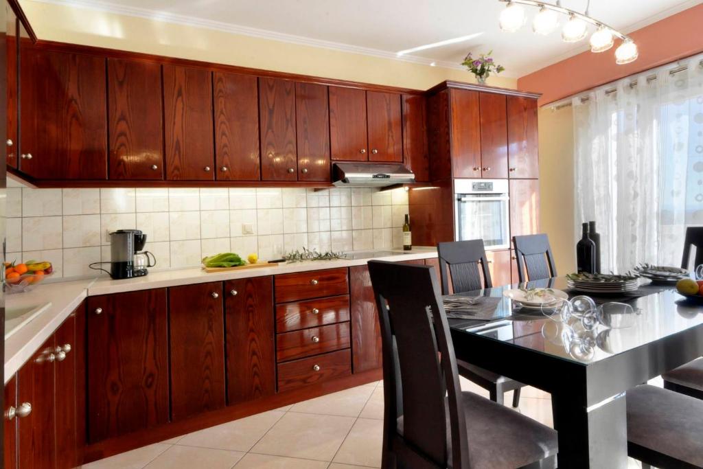 Kuchyň nebo kuchyňský kout v ubytování SG Suites Corfu, A
