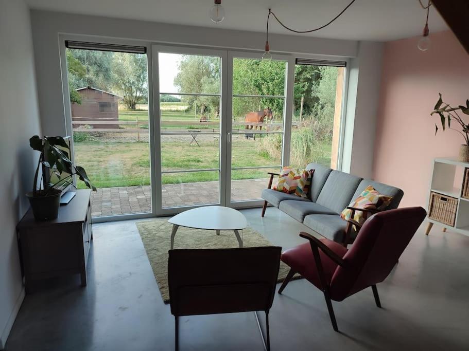 Posezení v ubytování Huis Belijn