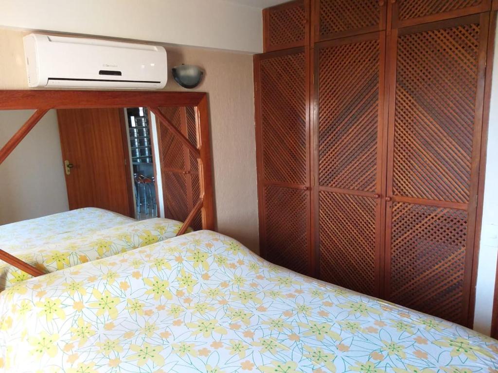 Postel nebo postele na pokoji v ubytování Condomínio das gaivotas