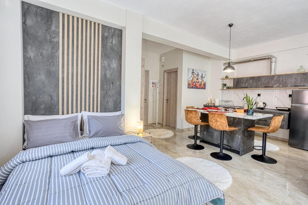 Ένα ή περισσότερα κρεβάτια σε δωμάτιο στο V&V Central Apartment in Pyli Vol. 2