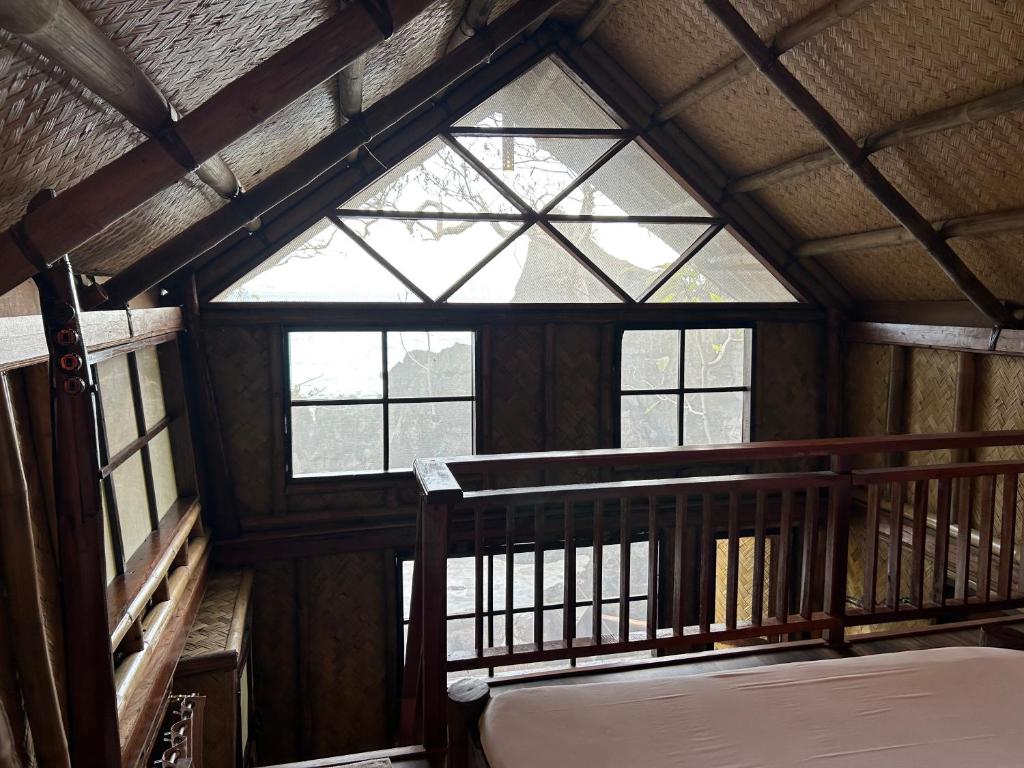 Letto o letti in una camera di Sangat Island Dive Resort